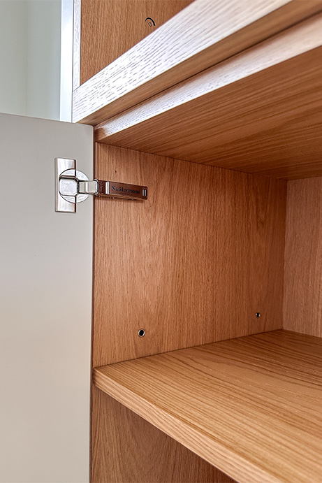 Project: Media Wall Asymmetric Design 5 Adjustable shelves in a bespoke media wall with premium brushed chrome shelf colours and spoons to create a more high quality durable finish.