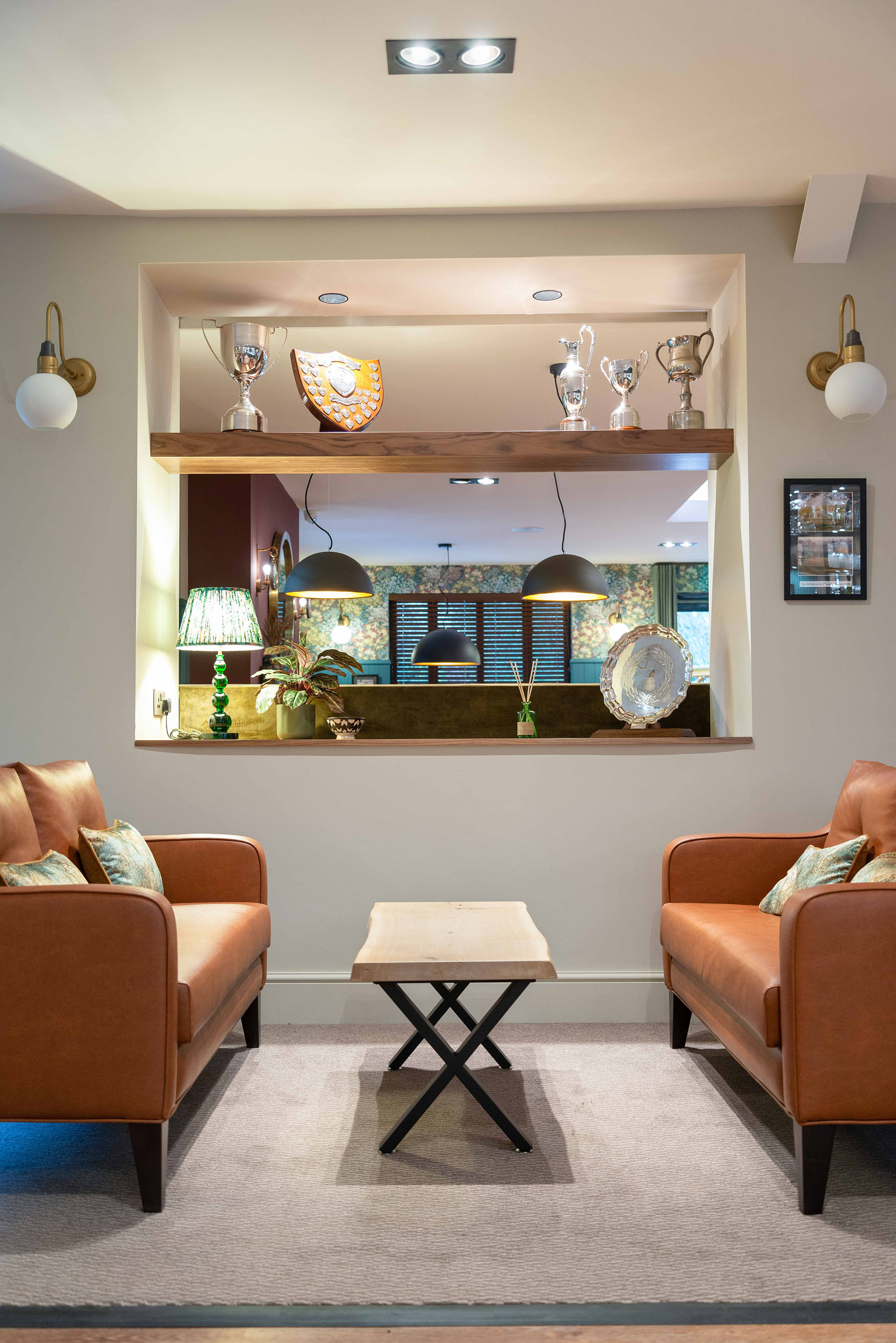 Two small sofas and a coffee table in the bar area. Part of the Bar Restaurant Interior Design at Bromsgrove Golf Centre