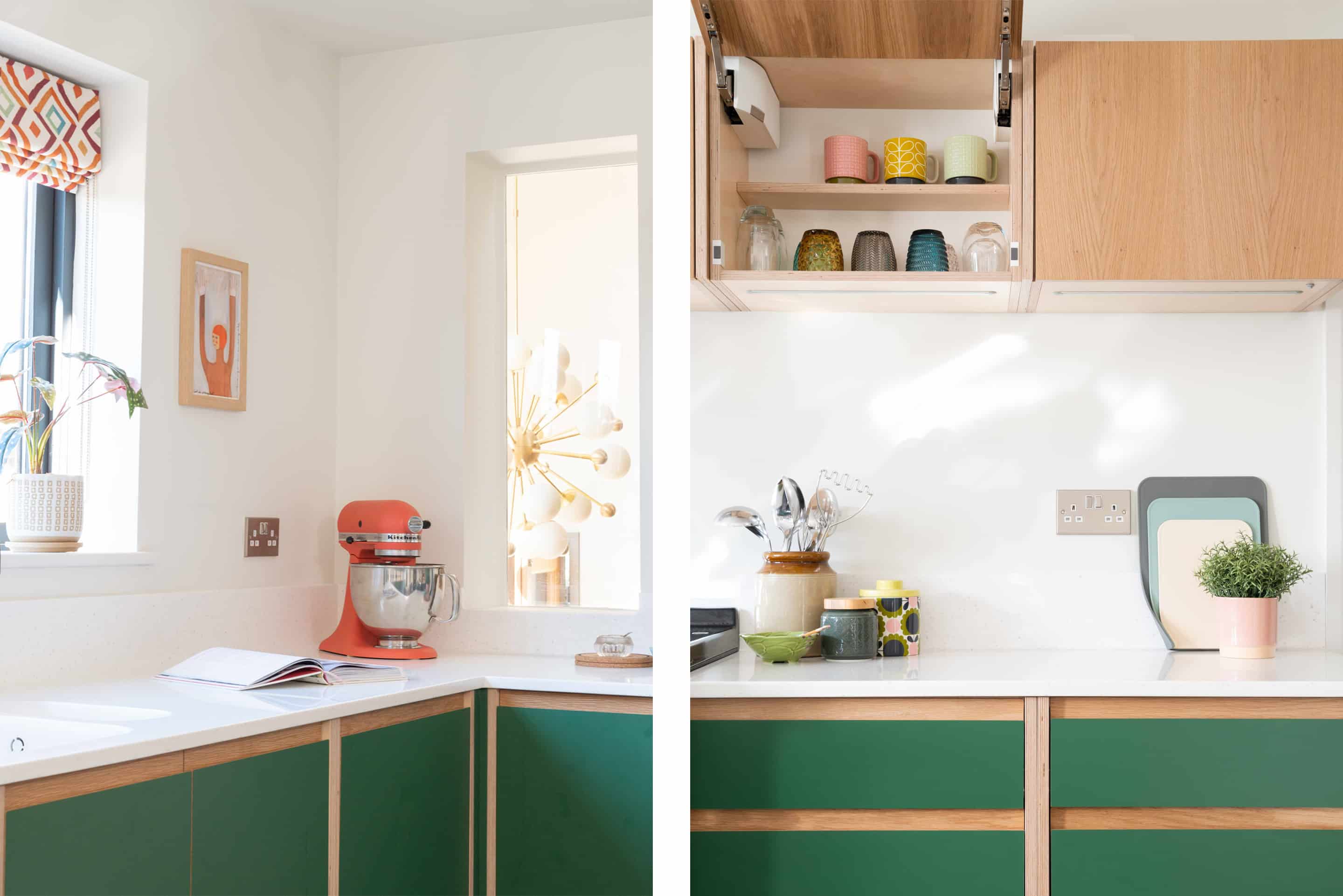 A handmade kitchen, with green melamine fronts and oak J-Pull handles, set into oak veneer birch ply cabinets with a white corian worksurface.