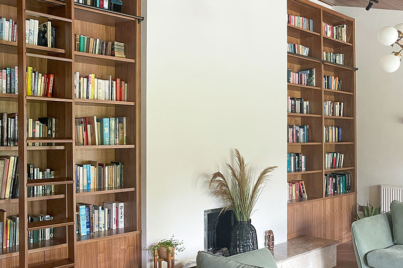 Supersized bespoke walnut bookcases
