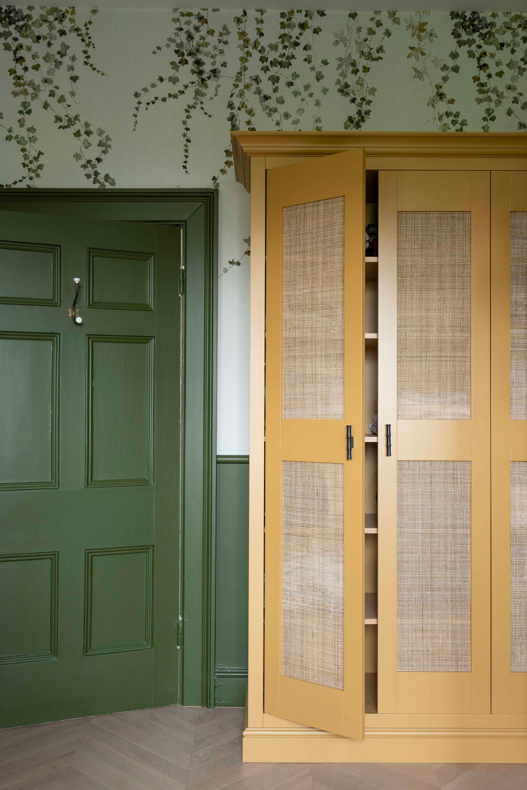 Handmade bespoke linen cupboard with oak shelving.