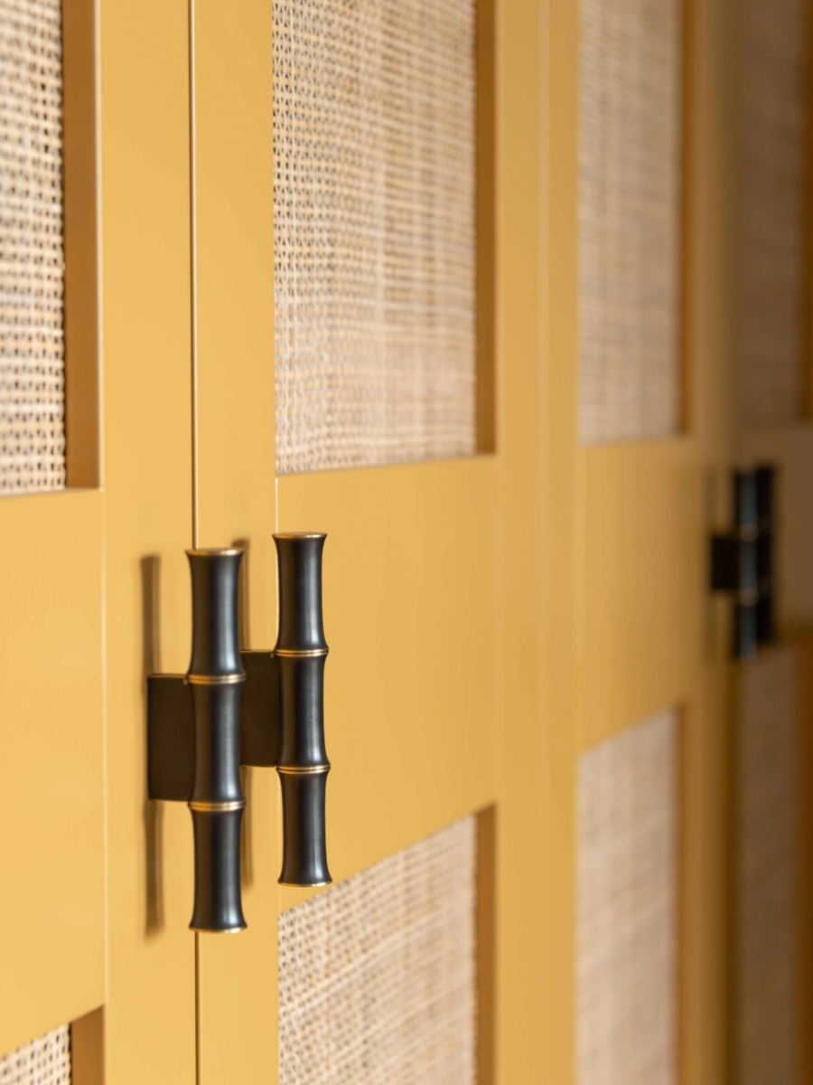Rattan doors for air circulation in a bespoke boot room