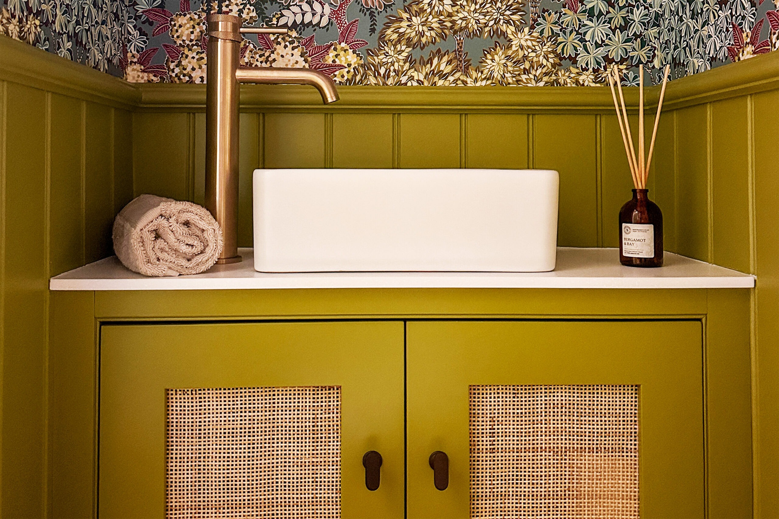 A bespoke vanity unit painted in vibrant Little Greene Citrine