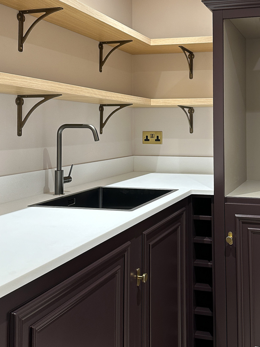 A combination of traditional style cabinetry and open shelving in this bespoke Utility Room